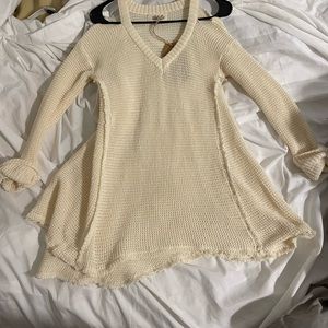 Listicle sweater top. Size M